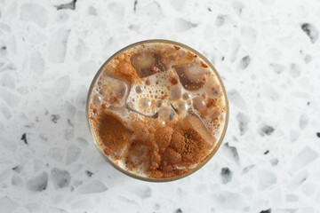 A top down view of an espresso latte drink.