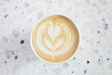A top down view of a latte coffee.