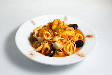 A view of a plate of pasta pescatore.