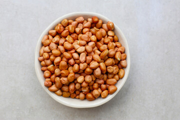 Raw peanuts with red skin