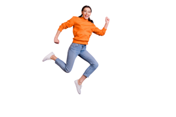 Full body photo of positive cheerful youth girl jump run after discounts feel content wear sportswear denim jeans white sneakers isolated over violet purple color background