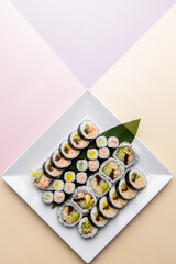 Sushi rolls maki on a white square plate art