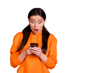Portrait of impressed funky youngster girl use her smartphone get like dislike in her social networking account wear sporty wear isolated over violet purple color background