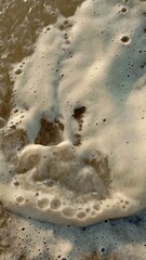 The afternoon light, with the view of the waves arriving at the shore