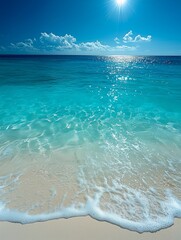 ocean background, water is turquoise and clear, there is prestine white sand at the bottom