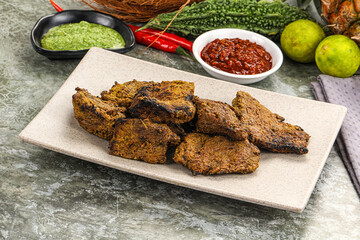 Grilled beef barbecue with spises