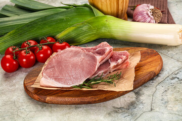 Raw pork steak loin with bone