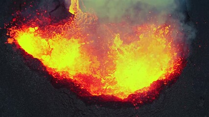 Inside volcanic eruption, new earth birth on Iceland, amazing crater spit lava - aerial 4k
