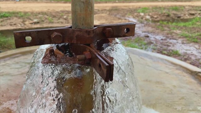 Closeup of a fountain borewell or a borewell that has struck a high-pressure aquifer.