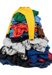 Large messy pile of colorful laundry clothes isolated on white background