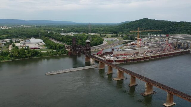 Stunning 4K drone footage of Chickamauga Dam, showcasing its structure, the Tennessee River, and scenic beauty. Perfect for infrastructure, travel, or history projects.