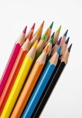 Fototapeta premium Colorful bunch of sharpened drawing pencils isolated on a white background