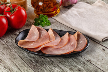 Smoked pork tenderloin fillet slices