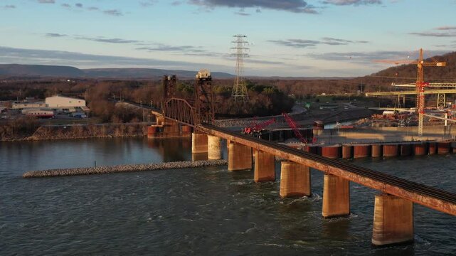 Stunning 4K drone footage of Chickamauga Dam, showcasing its structure, the Tennessee River, and scenic beauty. Perfect for infrastructure, travel, or history projects.