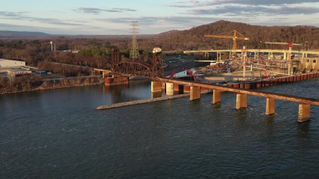 Stunning 4K drone footage of Chickamauga Dam, showcasing its structure, the Tennessee River, and scenic beauty. Perfect for infrastructure, travel, or history projects.