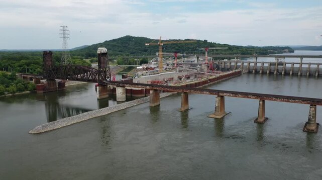 Stunning 4K drone footage of Chickamauga Dam, showcasing its structure, the Tennessee River, and scenic beauty. Perfect for infrastructure, travel, or history projects.