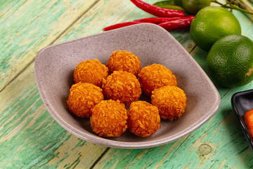 Fried crispy yellow cheese balls