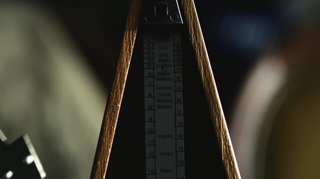 Musical Metronome side to side hypnotic pendulum tempo action CLOSE-UP