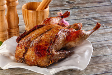 Baked with spices whole duck