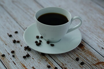 cup of coffee on wooden table