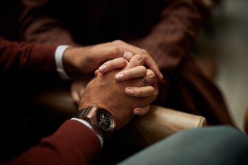 Fototapeta premium Close-Up of Hands Holding Each Other in a Moment of Comfort and Care