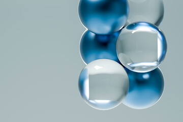 Abstract floating blue glass marbles on a minimal background