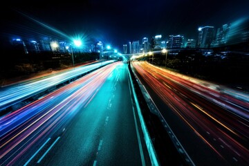 Obraz premium Vibrant city lights and dynamic traffic trails illuminate the bustling urban nightlife, showcasing a modern cityscape transformation.