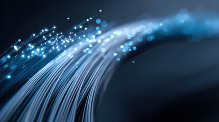 Fiber Optic Cables Transmitting Data in a Network Infrastructure, Illuminated with Blue Light, Representing High Speed Internet