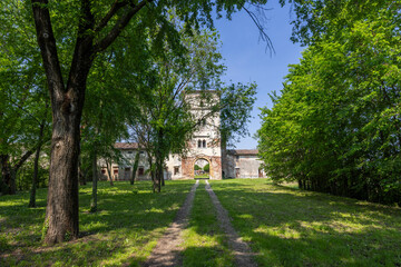 Exploring the historic Castello di Pojana Maggiore in Veneto, Italy, during a sunny spring day
