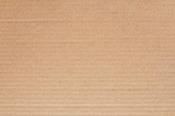 Fototapeta premium Cardboard sheet texture background, detail of recycle brown paper box pattern.