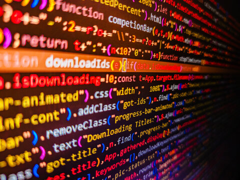 Shallow depth of field, selective focus effect. Programming on monitor background. Developer working on websites codes in office. Coding script text on screen. PHP development, software site code