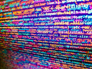 Computer script typing work. Big data storage and cloud computing representation. Computer code data. Cyber abstract of web application. Website Coding. Screen of web developing javascript code