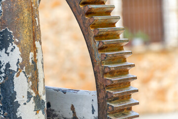 Old, rusty cogwheels on an old industrial machine