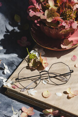 glasses and cup with hydrangeas