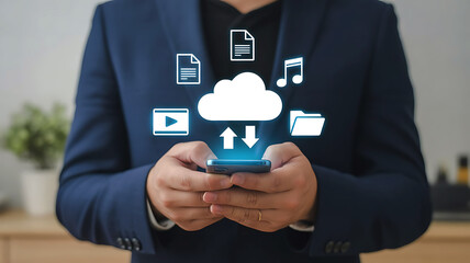 Businessman using smartphone with cloud computing technology and digital data icons for seamless file transfer