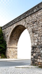 Ancient stone arch bridge over a road