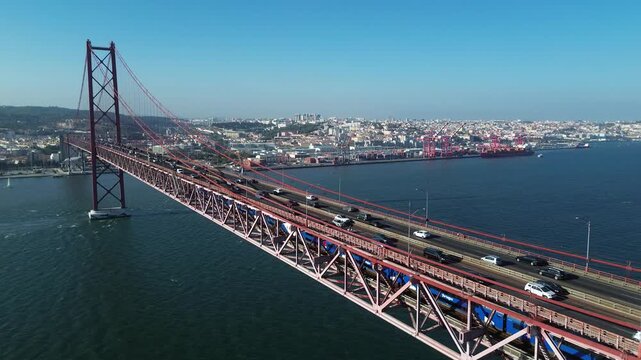 Drone view of the Bridge of 25 April. Ponte 25 de Abril. Suspension bridge over the Tejo River. Lisbon, Portugal. 08.08.2025