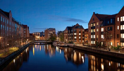 Naklejka premium City canal twilight reflection, buildings, waterfront, cityscape, dusk, urban, real estate, evening, navigation, tourism