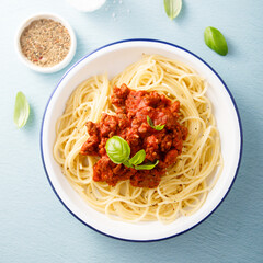 Traditional spaghetti Bolognese with fresh basil
