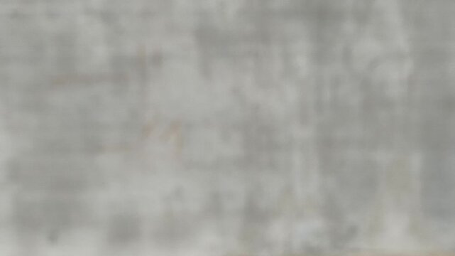 Blurred concrete or cement wall abstract smooth white and gray color plain background texture with copy space for graphic use. Faded minimal vintage style background for business or advertisement.