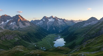 Fototapeta premium Stunning mountain landscape with lake reflecting golden light at sunset, perfect travel scene