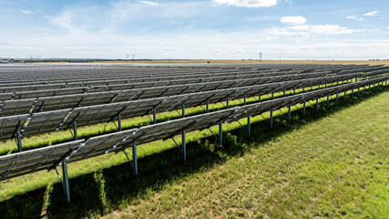 Solar Panels in Field and Clouds