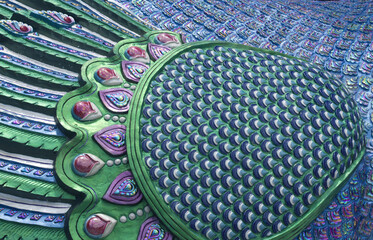 Scales of the dragon statue. Stucco surface of the animal