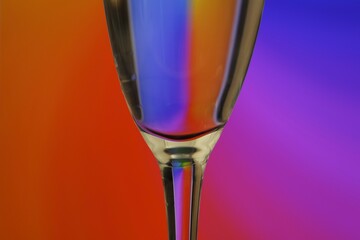 Close-Up of a Glass Against a Vibrant Multicolored Background