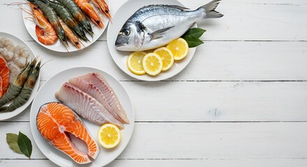 Fresh seafood assortment on white wooden background ready to cook