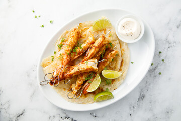 Shrimp skewers with fresh lime