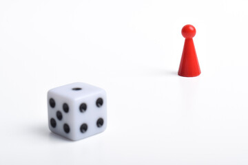 Red board game figures and dice isolated on white background