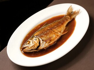 Braised fillet fish tail in brown sauce