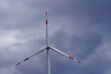 Modern wind turbines generating clean, renewable energy symbolize sustainable climate solutions and green energy.