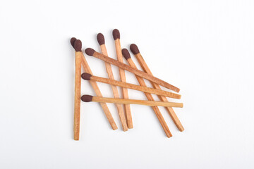 Wooden match isolated on white background. Piles of matchstick